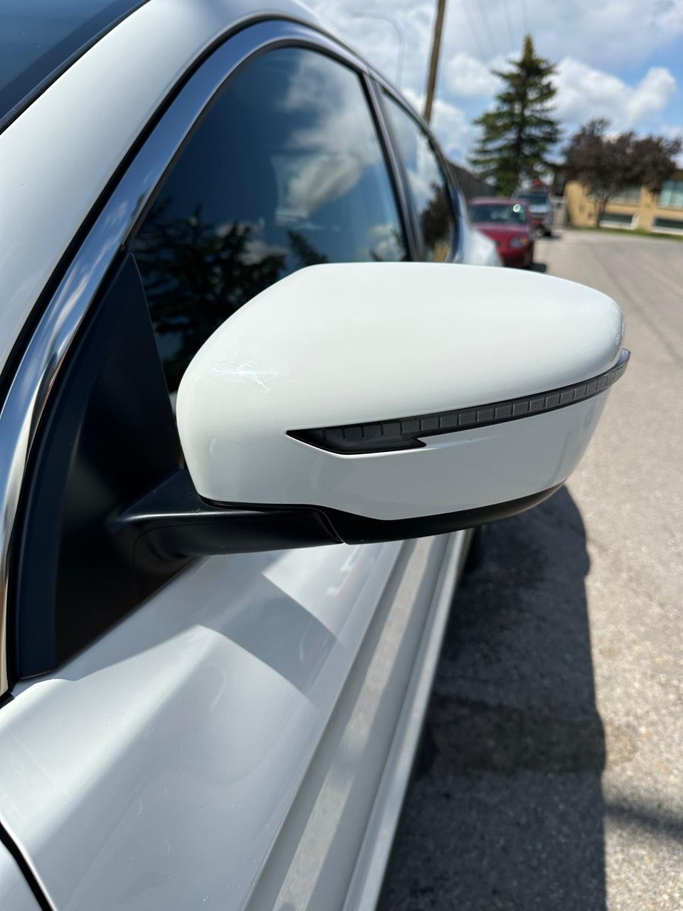 Clean polished car mirror after exterior detail — Arc Detailing Calgary