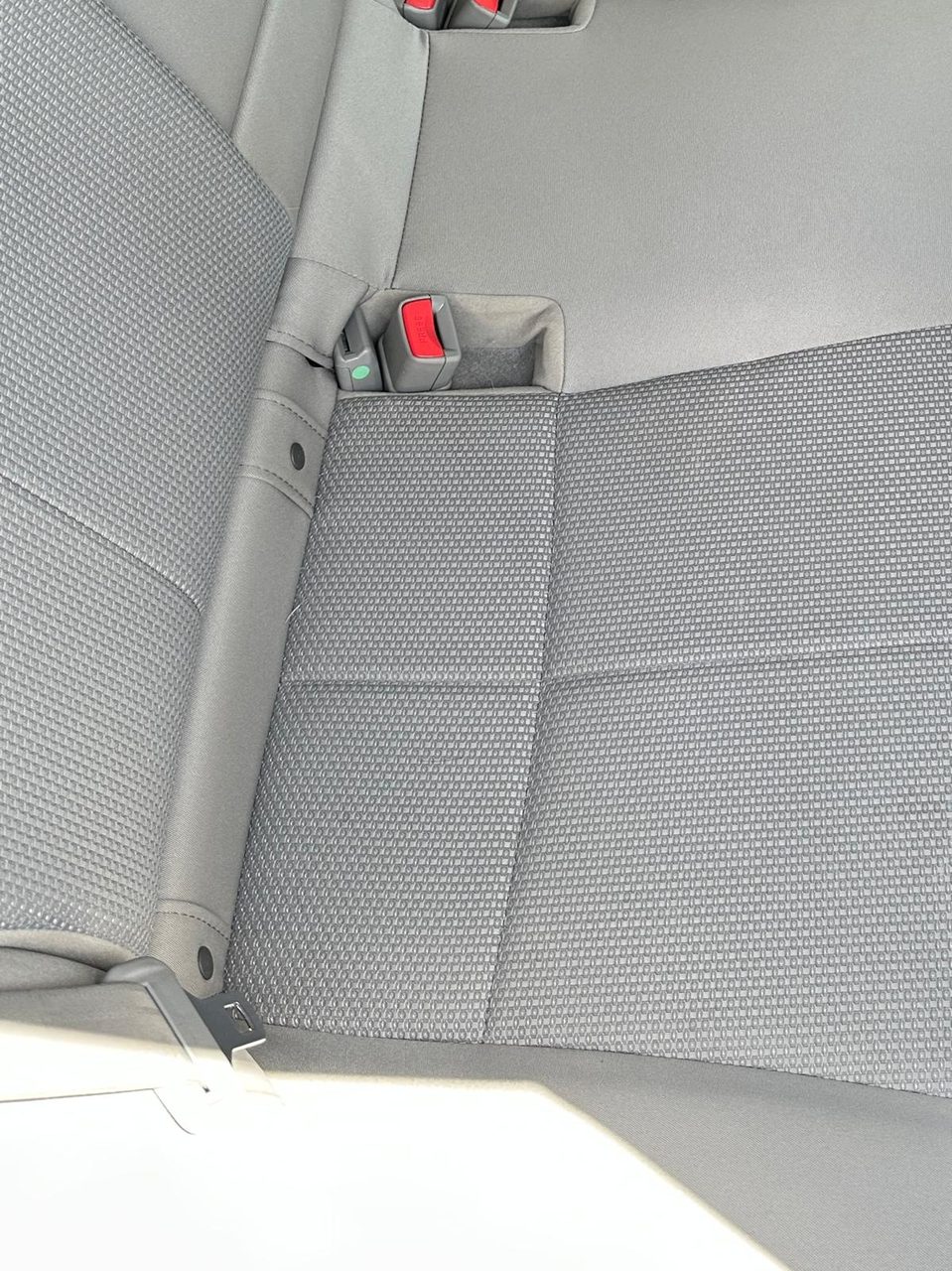 Fabric car seat after stain removal — Arc Detailing Calgary