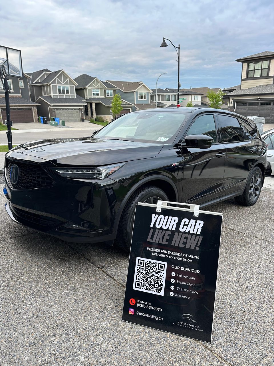 Freshly detailed black Acura MDX — Arc Detailing Calgary